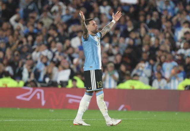 (261007) -- BUENOS AIRES, Oct. 7, 2026 (Xinhua) -- Nicolas Otamendi of Argentina celebrates after scoring during a football friendly match between Argentina and Benin at the Monumental Stadium in Buenos Aires, capital of Argentina, on Oct. 6, 2026. The match marked Lionel Messi's final appearance for the Argentina national football team. (Photo by Martin Zabala/Xinhua)