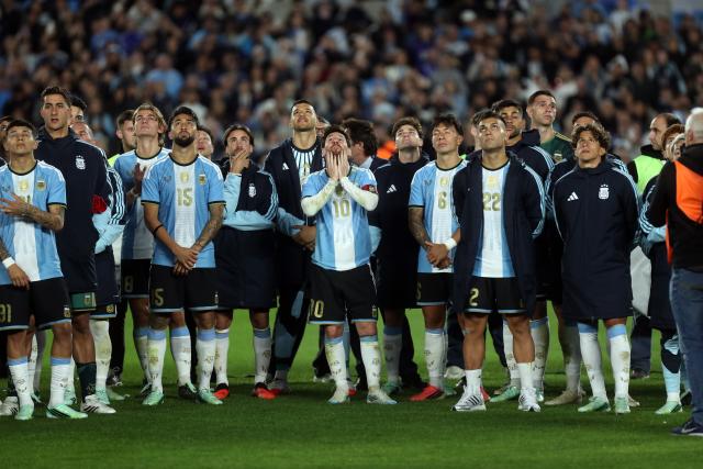 (261007) -- BUENOS AIRES, Oct. 7, 2026 (Xinhua) -- Lionel Messi (C) of Argentina watches a drone show with his teammates after a football friendly match between Argentina and Benin at the Monumental Stadium in Buenos Aires, capital of Argentina, on Oct. 6, 2026. The match marked Lionel Messi's final appearance for the Argentina national football team. (Photo by Martin Zabala/Xinhua)