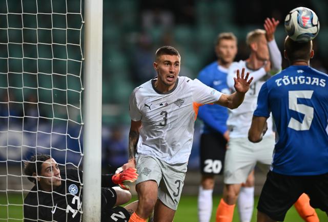 (261007) -- TALLINN, Oct. 7, 2026 (Xinhua) -- Iceland's Daniel Leo Gretarsson (C) reacts near the goal as Estonia's Erko Tougjas (R) and goalkeeper Matvei Igonen (L) defend during the UEFA Nations League 2026/27 League C Group C4 match between Estonia and Iceland at A. Le Coq Arena in Tallinn, Estonia, Oct. 6, 2026. (Photo by Sergei Stepanov/Xinhua)