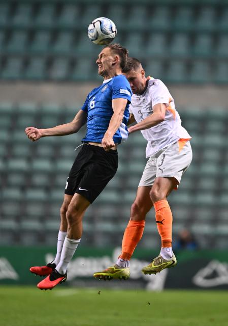 (261007) -- TALLINN, Oct. 7, 2026 (Xinhua) -- Estonia's Rasmus Peetson (L) and Iceland's Daniel Leo Gretarsson head for the ball during the UEFA Nations League 2026/27 League C Group C4 match between Estonia and Iceland at A. Le Coq Arena in Tallinn, Estonia, Oct. 6, 2026. (Photo by Sergei Stepanov/Xinhua)