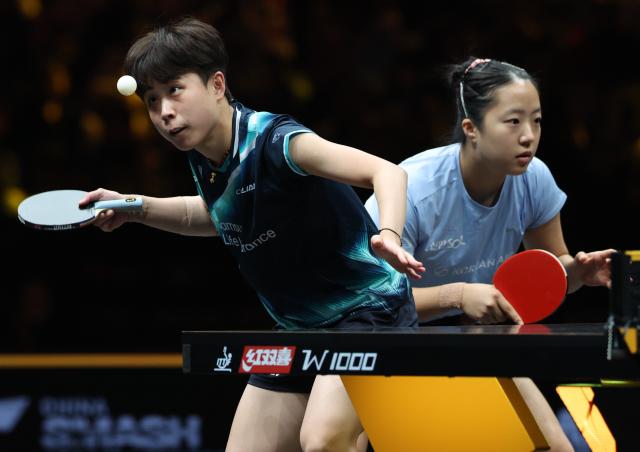 (261007) -- BEIJING, Oct. 7, 2026 (Xinhua) -- Shin Yubin/Joo Cheonhui (L) of South Korea compete during the women's doubles round of 16 match between Wang Yidi/Jiang Yiyi of China and Shin Yubin/Joo Cheonhui of South Korea at 2026 World Table Tennis (WTT) China Smash in Beijing, China, Oct. 7, 2026. (Xinhua/Zhang Chenlin)