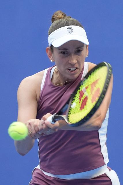 (261007) -- BEIJING, Oct. 7, 2026 (Xinhua) -- Elise Mertens competes during the women's singles fourth round match between Coco Gauff of the United States and Elise Mertens of Belgium at 2026 China Open tennis tournament in Beijing, China, Oct. 7, 2026. (Xinhua/Ju Huanzong)