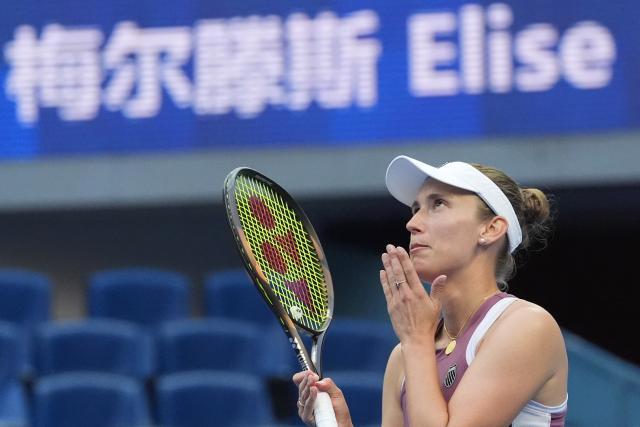(261007) -- BEIJING, Oct. 7, 2026 (Xinhua) -- Elise Mertens celebrates after the women's singles fourth round match between Coco Gauff of the United States and Elise Mertens of Belgium at 2026 China Open tennis tournament in Beijing, China, Oct. 7, 2026. (Xinhua/Ju Huanzong)