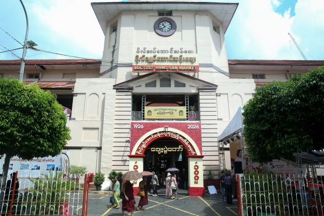 (261007) -- YANGON, Oct. 7, 2026 (Xinhua) -- People walk into Bogyoke Aung San Market in Yangon, Myanmar, Oct. 7, 2026.
  TO GO WITH "Feature: Myanmar's century-old market celebrates its enduring heritage" (Xinhua/Myo Kyaw Soe)