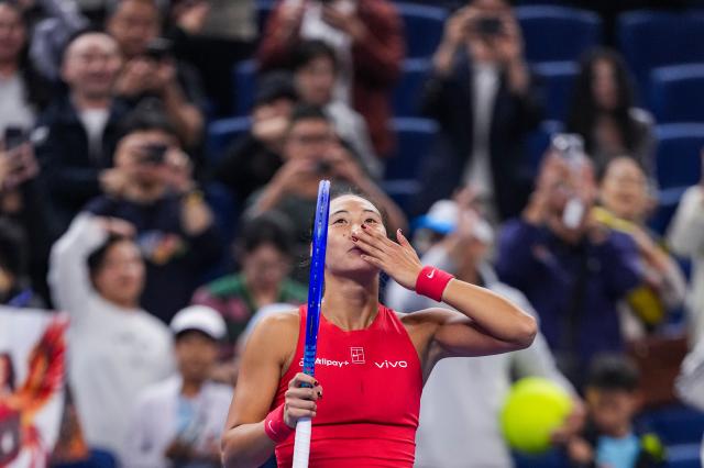 (261007) -- BEIJING, Oct. 7, 2026 (Xinhua) -- Zheng Qinwen of China celebrates after winning the women's singles fourth round match between Zheng Qinwen of China and Alina Charaeva of Armenia at 2026 China Open tennis tournament in Beijing, China, Oct. 7, 2026. (Xinhua/Sun Fei)