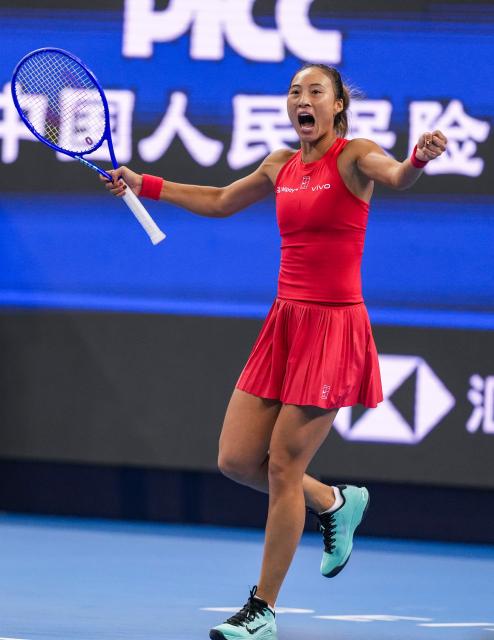 (261007) -- BEIJING, Oct. 7, 2026 (Xinhua) -- Zheng Qinwen of China celebrates after winning the women's singles fourth round match between Zheng Qinwen of China and Alina Charaeva of Armenia at 2026 China Open tennis tournament in Beijing, China, Oct. 7, 2026. (Xinhua/Sun Fei)
