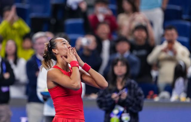 (261007) -- BEIJING, Oct. 7, 2026 (Xinhua) -- Zheng Qinwen of China celebrates after winning the women's singles fourth round match between Zheng Qinwen of China and Alina Charaeva of Armenia at 2026 China Open tennis tournament in Beijing, China, Oct. 7, 2026. (Xinhua/Sun Fei)