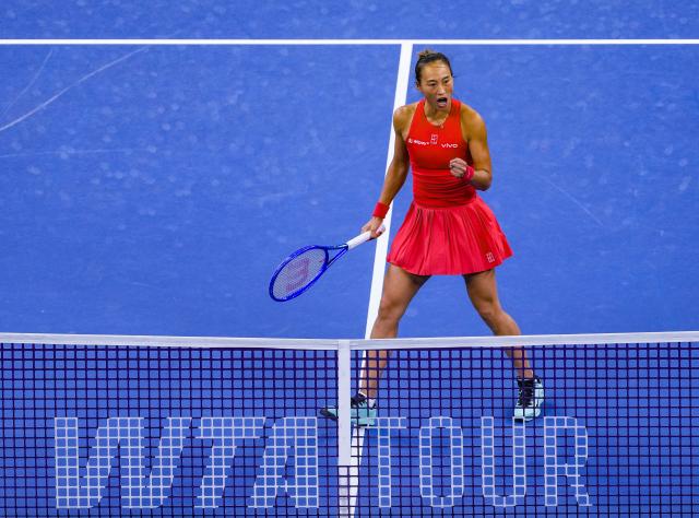 (261007) -- BEIJING, Oct. 7, 2026 (Xinhua) -- Zheng Qinwen of China reacts during the women's singles fourth round match between Zheng Qinwen of China and Alina Charaeva of Armenia at 2026 China Open tennis tournament in Beijing, China, Oct. 7, 2026. (Xinhua/Sun Fei)