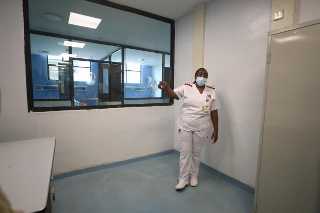 (261007) -- NAIROBI, Oct. 7, 2026 (Xinhua) -- A medical worker introduces an isolation ward for Ebola patients at Nairobi Hospital in Nairobi, Kenya, Oct. 7, 2026. Kenya on Tuesday confirmed its first imported case of Bundibugyo Ebola virus disease, one day after a man died in a Nairobi hospital, the country's health authorities said. (Photo by Henry Naminde/Xinhua)