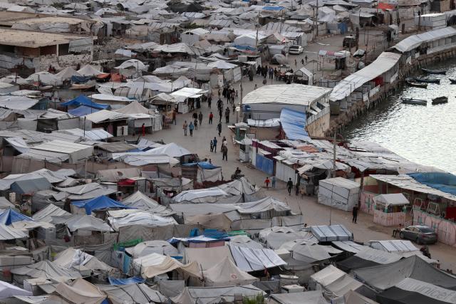 (261007) -- GAZA CITY, Oct. 7, 2026 (Xinhua) -- This photo taken on Oct. 6, 2026 shows a view of a makeshift tent camp in Gaza City. The latest round of Gaza conflict marks its third anniversary on Wednesday. (Photo by Rizek Abdeljawad/Xinhua)