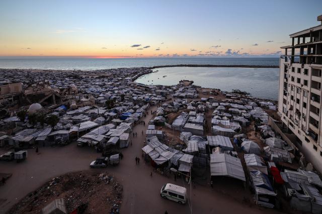 (261007) -- GAZA CITY, Oct. 7, 2026 (Xinhua) -- This photo taken on Oct. 6, 2026 shows a view of a makeshift tent camp in Gaza City. The latest round of Gaza conflict marks its third anniversary on Wednesday. (Photo by Rizek Abdeljawad/Xinhua)