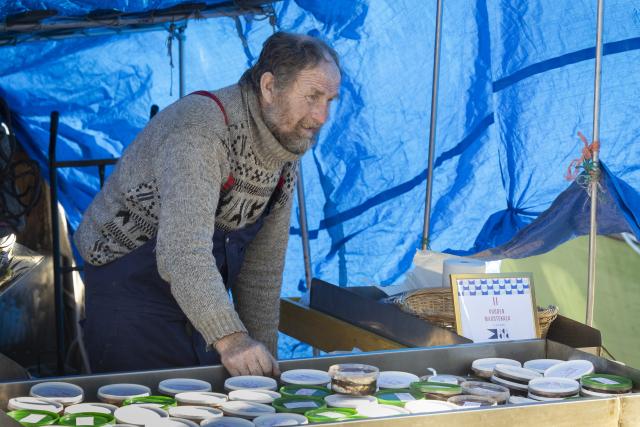 (261007) -- HELSINKI, Oct. 7, 2026 (Xinhua) -- A vendor waits for customers during the Helsinki Baltic Herring Market at Market Square in Helsinki, capital of Finland, Oct. 7, 2026. The Helsinki Baltic Herring Market is held in Helsinki, the capital of Finland. In 2026, it runs from October 4 to 10. Dating back to 1743, it is one of Finland's oldest public events, aimed at supporting fishermen's livelihoods and promoting local seafood, particularly Baltic herring. (Photo by Matti Matikainen/Xinhua)