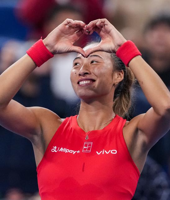 (261008) -- BEIJING, Oct. 8, 2026 (Xinhua) -- Zheng Qinwen of China celebrates after winning the women's singles fourth round match between Zheng Qinwen of China and Alina Charaeva of Armenia at 2026 China Open tennis tournament in Beijing, China, Oct. 7, 2026. (Xinhua/Sun Fei)