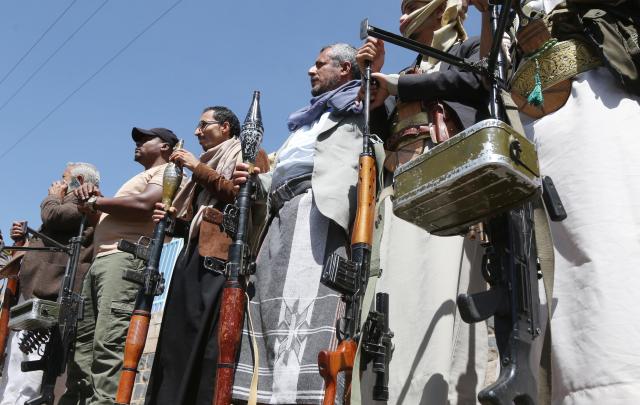 (261008) -- SANAA, Oct. 8, 2026 (Xinhua) -- Houthi supporters take part in an armed rally staged against the involvement of Türkiye and Pakistan with Saudi Arabia in Yemen's conflict, in Sanaa, Yemen, on Oct. 7, 2026. Supporters of Yemen's Houthi group took part in an armed rally in the capital Sanaa on Wednesday to announce military mobilization. Yemen's Houthi leader Abdul-Malik al-Houthi on Wednesday called on Türkiye and Pakistan not to be drawn into Yemen's conflict alongside Saudi Arabia, as fighting intensifies and Riyadh strengthens defense cooperation with the two countries. (Photo by Mohammed Mohammed/Xinhua)