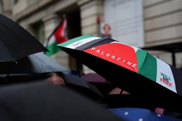 (261008) -- LONDON, Oct. 8, 2026 (Xinhua) -- People participate in a pro-Palestinian demonstration in London, Britain, Oct. 7, 2026. Eleven people were arrested as multiple pro-Palestinian demonstrations were held in London on Wednesday, the Metropolitan Police was quoted by the BBC on Wednesday as saying. (Xinhua/Zhang Feng)