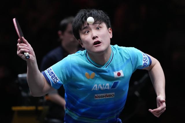 (261008) -- BEIJING, Oct. 8, 2026 (Xinhua) -- Harimoto Tomokazu of Japan serves during the men's singles round of 16 match between Zhou Qihao of China and Harimoto Tomokazu of Japan at 2026 World Table Tennis (WTT) China Smash in Beijing, China, Oct. 8, 2026. (Xinhua/Ju Huanzong)