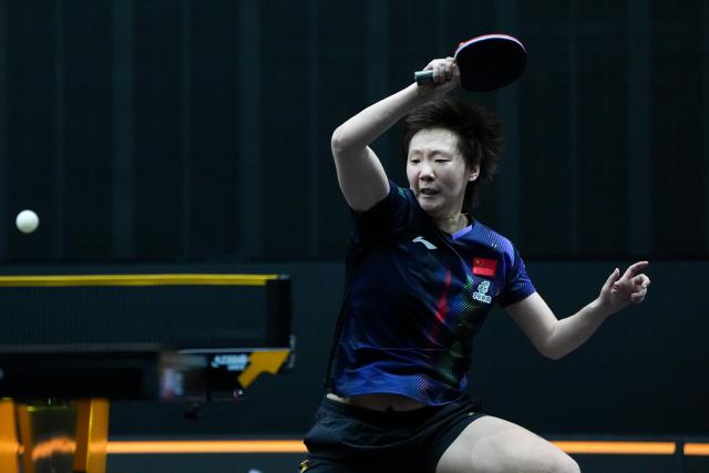 (261008) -- BEIJING, Oct. 8, 2026 (Xinhua) -- Wang Manyu of China hits a return during the women's singles round of 16 match between Wang Manyu of China and Shi Xunyao of China at 2026 World Table Tennis (WTT) China Smash in Beijing, China, Oct. 8, 2026. (Xinhua/Ju Huanzong)