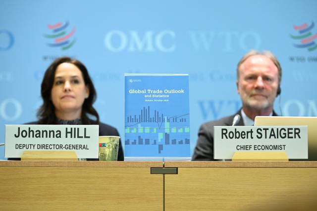(261008) -- GENEVA, Oct. 8, 2026 (Xinhua) -- A copy of the World Trade Organization (WTO)'s latest Global Trade Outlook and Statistics report is pictured during a press conference at the WTO headquarters in Geneva, Switzerland, Oct. 8, 2026. WTO said on Thursday that global merchandise trade is expected to grow by 3.9 percent in 2026, up from its March forecast of 1.9 percent, driven by supply chain adaptation and strong investment in artificial intelligence (AI). (Xinhua/Lian Yi)