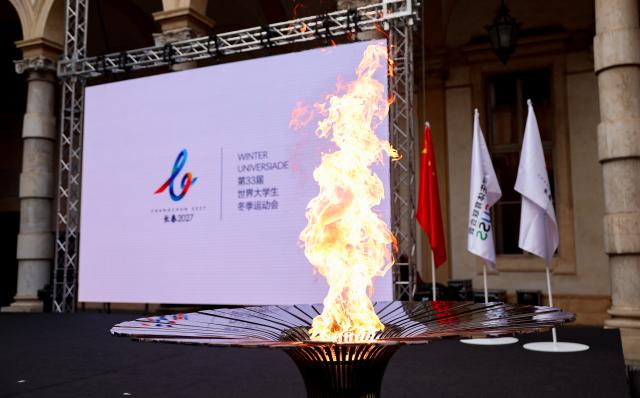 (261009) -- TURIN, Oct. 9, 2026 (Xinhua) -- The cauldron is lit during the flame collection ceremony for the Changchun 2027 Winter Universiade in Turin, Italy, Oct. 8, 2026. (Xinhua/Wang Kaiyan)