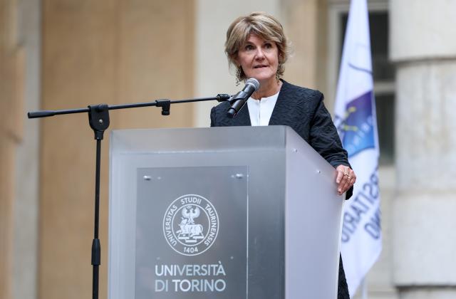 (261009) -- TURIN, Oct. 9, 2026 (Xinhua) -- Cristina Prandi, rector of the University of Turin, delivers a speech during the flame collection ceremony for the Changchun 2027 Winter Universiade in Turin, Italy, Oct. 8, 2026. (Xinhua/Wang Kaiyan)