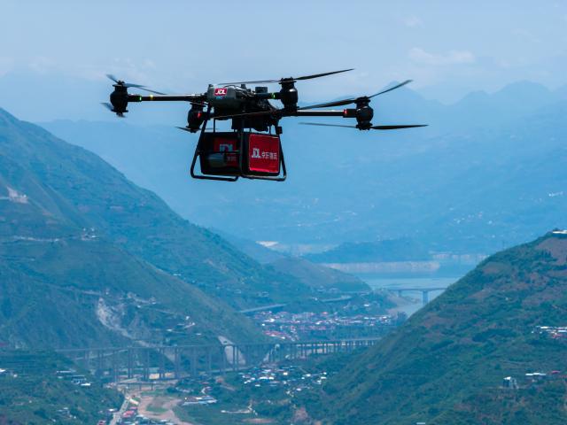 (261009) -- CHENGDU, Oct. 9, 2026 (Xinhua) -- This photo taken in April 2026 shows a drone of JD Logistics taking part in the harvest of sweet cherry in Hanyuan County, southwest China's Sichuan Province. (Xinhua)