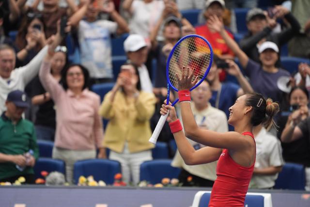 (261009) -- BEIJING, Oct. 9, 2026 (Xinhua) -- Zheng Qinwen celebrates after winning the women's singles quarterfinal match between Zheng Qinwen of China and Elina Svitolina of Ukraine at 2026 China Open tennis tournament in Beijing, China, Oct. 9, 2026. (Xinhua/Xie Han)