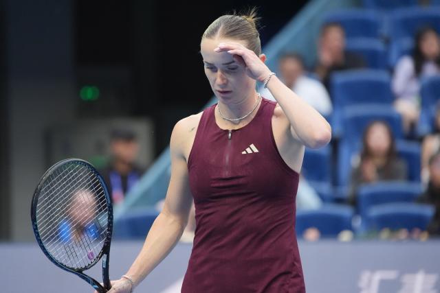 (261009) -- BEIJING, Oct. 9, 2026 (Xinhua) -- Elina Svitolina reacts during the women's singles quarterfinal match between Zheng Qinwen of China and Elina Svitolina of Ukraine at 2026 China Open tennis tournament in Beijing, China, Oct. 9, 2026. (Xinhua/Xie Han)