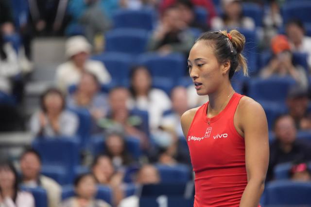 (261009) -- BEIJING, Oct. 9, 2026 (Xinhua) -- Zheng Qinwen reacts the women's singles quarterfinal match between Zheng Qinwen of China and Elina Svitolina of Ukraine at 2026 China Open tennis tournament in Beijing, China, Oct. 9, 2026. (Xinhua/Xie Han)