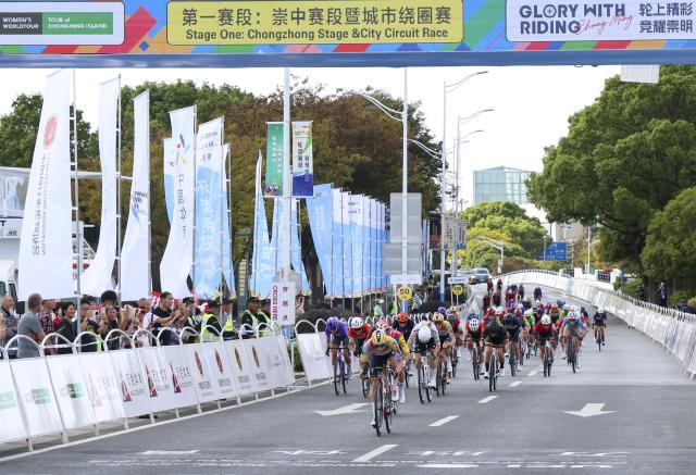 (261009) -- SHANGHAI, Oct. 9, 2026 (Xinhua) -- Cyclists compete during the Stage 1 of the UCI Women's WorldTour Tour of Chongming Island road cycling race in Shanghai, east China, Oct. 9, 2026. (Xinhua/Chen Haoming)