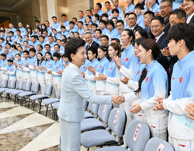 (261009) -- BEIJING, Oct. 9, 2026 (Xinhua) -- Chinese State Councilor Shen Yiqin meets with the Chinese delegation to the Aichi-Nagoya Asian Games, in Beijing, capital of China, Oct. 9, 2026. (Xinhua/Gao Jie)