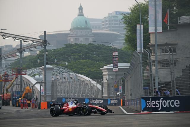 (261009) -- SINGAPORE, Oct. 9, 2026 (Xinhua) -- Ferrari's Charles Leclerc of Monaco drives during the practice session of the Formula One Singapore Grand Prix at the Marina Bay Street Circuit in Singapore, Oct. 9, 2026. (Photo by Then Chih Wey/Xinhua)