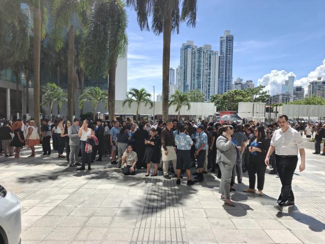 (261009) -- PANAMA CITY, Oct. 9, 2026 (Xinhua) -- People gather outside following an earthquake in Panama City, Panama, Oct. 9, 2026. Major earthquake strikes Panama on Friday. (Xinhua/Li Jiaxu)