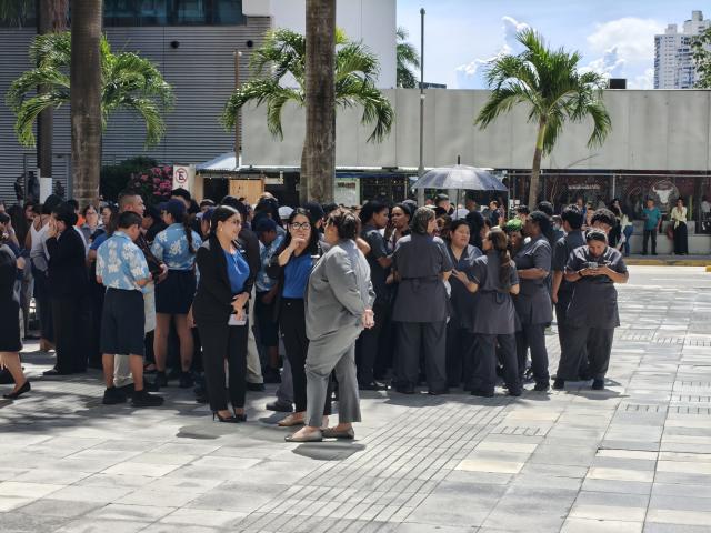 (261009) -- PANAMA CITY, Oct. 9, 2026 (Xinhua) -- People gather outside following an earthquake in Panama City, Panama, Oct. 9, 2026. A major earthquake struck Panama on Friday. (Xinhua/Li Jiaxu)