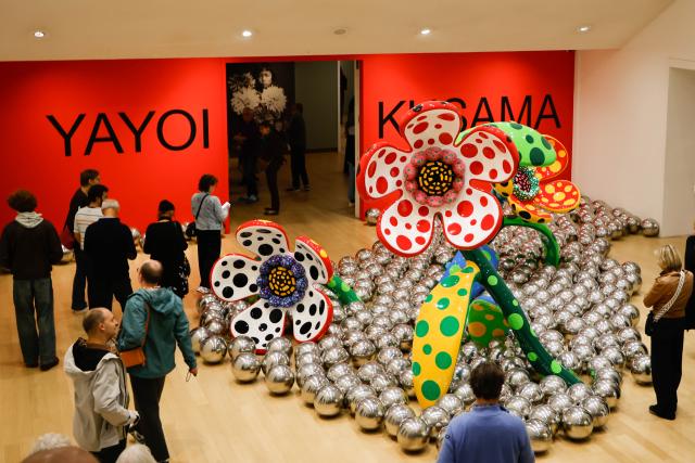 (261009) -- AMSTERDAM, Oct. 9, 2026 (Xinhua) -- Visitors view art works of Japanese artist Yayoi Kusama during a major retrospective at the Stedelijk Museum in Amsterdam, the Netherlands, Oct. 9, 2026. (Photo by Sylvia Lederer/Xinhua)