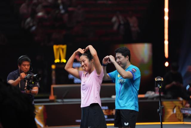 (261010) -- BEIJING, Oct. 10, 2026 (Xinhua) -- Lim Jonghoon/Shin Yubin (front L) of South Korea celebrate after winning the mixed doubles final match against Lin Yun-Ju/Cheng I-Ching of Chinese Taipei at 2026 World Table Tennis (WTT) China Smash in Beijing, China, Oct. 9, 2026. (Xinhua/Xie Han)