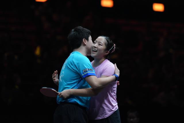 (261010) -- BEIJING, Oct. 10, 2026 (Xinhua) -- Lim Jonghoon (L)/Shin Yubin of South Korea celebrate after winning the mixed doubles final match against Lin Yun-Ju/Cheng I-Ching of Chinese Taipei at 2026 World Table Tennis (WTT) China Smash in Beijing, China, Oct. 9, 2026. (Xinhua/Xie Han)