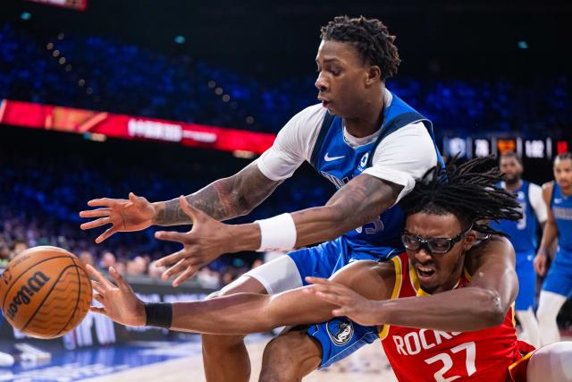 (261010) -- MACAO, Oct. 10, 2026 (Xinhua) -- Isaiah Crawford (R) of Houston Rockets vies with Tobi Lawal of Dallas Mavericks during the 2026-2027 NBA preseason game between Houston Rockets and Dallas Mavericks in Macao, south China, Oct. 9, 2026. (Xinhua/Cheong Kam Ka)