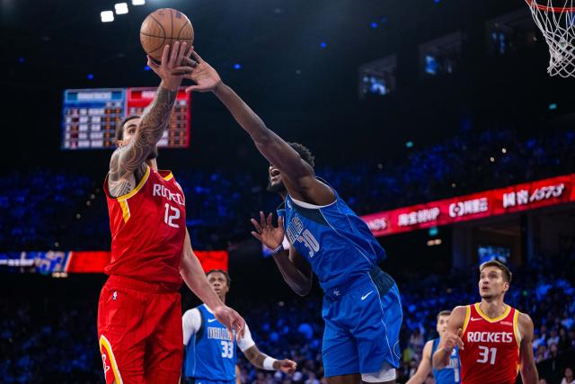 (261010) -- MACAO, Oct. 10, 2026 (Xinhua) -- Steven Adams (front L) of Houston Rockets vies with Moussa Cisse of Dallas Mavericks during the 2026-2027 NBA preseason game between Houston Rockets and Dallas Mavericks in Macao, south China, Oct. 9, 2026. (Xinhua/Cheong Kam Ka)