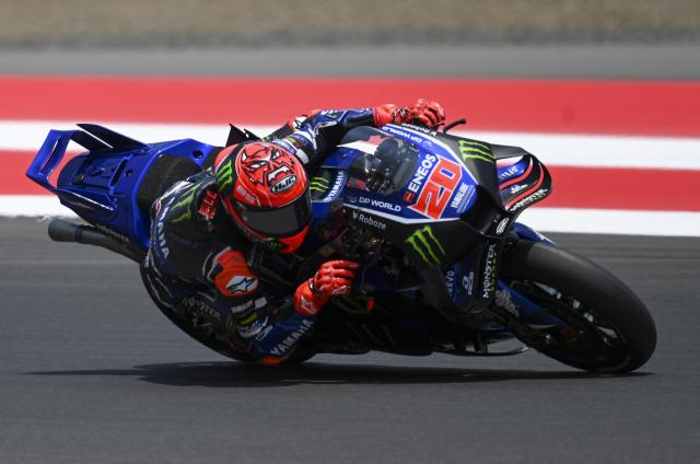 (261010) -- LOMBOK, Oct. 10, 2026 (Xinhua) -- Monster Energy Yamaha MotoGP Team's Fabio Quartararo of France races during the qualifying 2 at the Pertamina Grand Prix of Indonesia 2026 at Mandalika International circuit in Lombok, Indonesia, Oct. 10, 2026. (Xinhua/Zulkarnain)