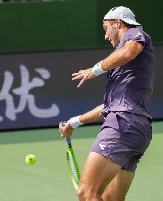 (261010) -- SHANGHAI, Oct. 10, 2026 (Xinhua) -- Jan-Lennard Struff of Germany hits a return during the men's singles second round match against Daniil Medvedev of Russia at the 2026 ATP tour Shanghai Masters tennis tournament in Shanghai, China, Oct. 10, 2026. (Xinhua/Ding Ting)
