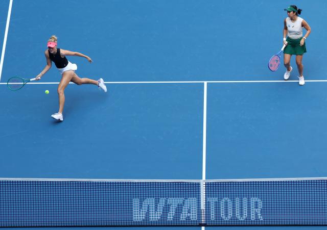 (261010) -- BEIJING, Oct. 10, 2026 (Xinhua) -- Erin Routliffe (L)/Aldila Sutjiadi compete during the women's doubles semifinal match between Katerina Siniakova (the Czech Republic)/Zhang Shuai (China) and Erin Routliffe (New Zealand)/Aldila Sutjiadi (Indonesia) at 2026 China Open tennis tournament in Beijing, China, Oct. 10, 2026. (Xinhua/Zhang Chenlin)