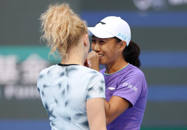 (261010) -- BEIJING, Oct. 10, 2026 (Xinhua) -- Katerina Siniakova/Zhang Shuai (R) discuss during the women's doubles semifinal match between Katerina Siniakova (the Czech Republic)/Zhang Shuai (China) and Erin Routliffe (New Zealand)/Aldila Sutjiadi (Indonesia) at 2026 China Open tennis tournament in Beijing, China, Oct. 10, 2026. (Xinhua/Zhang Chenlin)