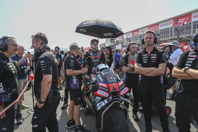 (261010) -- LOMBOK, Oct. 10, 2026 (Xinhua) -- Aprilia Racing's Marco Bezzecchi (C) of Italy prepares before the sprint race of MotoGP at Mandalika International circuit in Lombok, Indonesia, Oct. 10, 2026. (Xinhua/Zulkarnain)