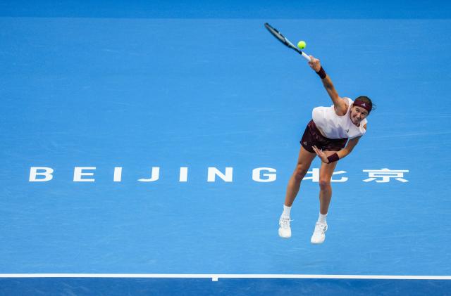 (261010) -- BEIJING, Oct. 10, 2026 (Xinhua) -- Nikola Bartunkova of the Czech Republic serves during the women's singles semifinal match against Mirra Andreeva of Russia at 2026 China Open tennis tournament in Beijing, China, Oct. 10, 2026. (Xinhua/Sun Fei)
