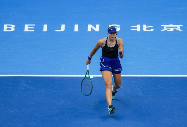 (261010) -- BEIJING, Oct. 10, 2026 (Xinhua) -- Mirra Andreeva of Russia celebrates scoring during the women's singles semifinal match against Nikola Bartunkova of the Czech Republic at 2026 China Open tennis tournament in Beijing, China, Oct. 10, 2026. (Xinhua/Sun Fei)