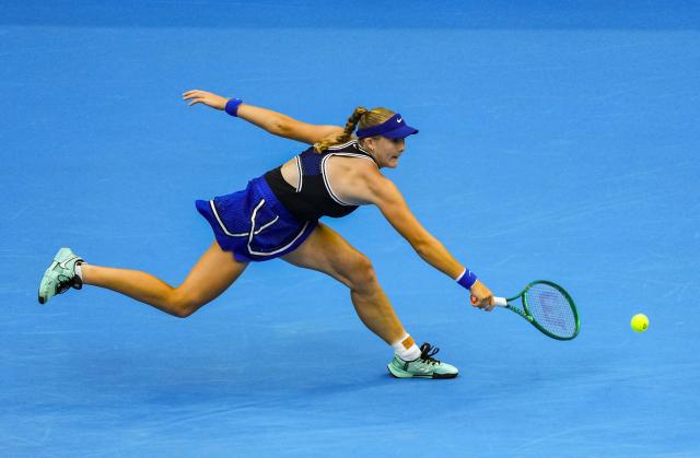 (261010) -- BEIJING, Oct. 10, 2026 (Xinhua) -- Mirra Andreeva of Russia hits a return during the women's singles semifinal match against Nikola Bartunkova of the Czech Republic at 2026 China Open tennis tournament in Beijing, China, Oct. 10, 2026. (Xinhua/Sun Fei)