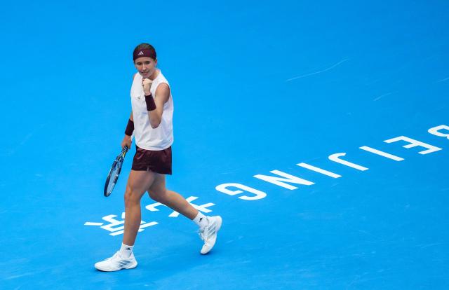 (261010) -- BEIJING, Oct. 10, 2026 (Xinhua) -- Nikola Bartunkova of the Czech Republic celebrates scoring during the women's singles semifinal match against Mirra Andreeva of Russia at 2026 China Open tennis tournament in Beijing, China, Oct. 10, 2026. (Xinhua/Sun Fei)