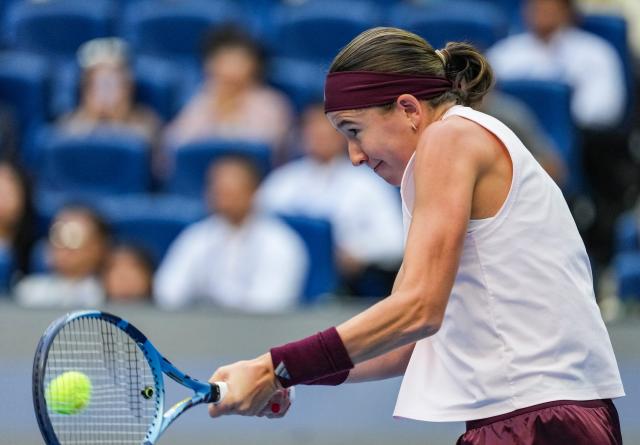 (261010) -- BEIJING, Oct. 10, 2026 (Xinhua) -- Nikola Bartunkova of the Czech Republic hits a return during the women's singles semifinal match against Mirra Andreeva of Russia at 2026 China Open tennis tournament in Beijing, China, Oct. 10, 2026. (Xinhua/Sun Fei)