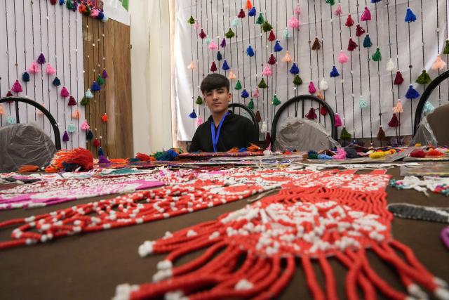 (261010) -- KABUL, Oct. 10, 2026 (Xinhua) -- Afghan handicrafts are displayed at a trade exhibition in Kabul, Afghanistan, Oct. 7, 2026. A major trade exhibition opened in Kabul, attracting hundreds of domestic and foreign investors to boost Afghanistan's trade ties with neighboring countries and unlock fresh opportunities for trade and investment. 
  TO GO WITH "Feature: Local trade exhibition bridges Afghan, int'l markets" (Photo by Saifurahman Safi/Xinhua)