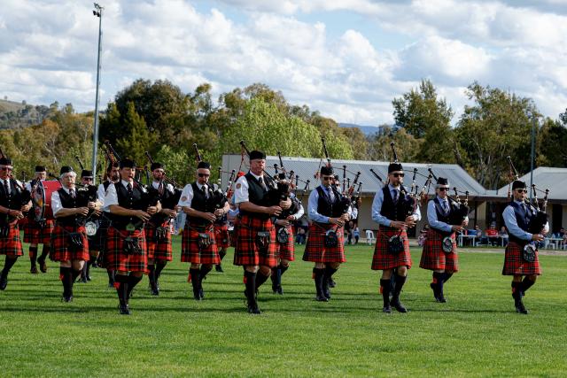 (261010) -- CANBERRA, Oct. 10, 2026 (Xinhua) -- Members of a pipe band perform during the Canberra Highland Gathering in Canberra, Australia, on Oct. 10, 2026. The Scottish cultural event featuring traditional sports, bagpipe and drum performances, dance and traditional food was held in Canberra on Saturday. (Photo by Chu Chen/Xinhua)